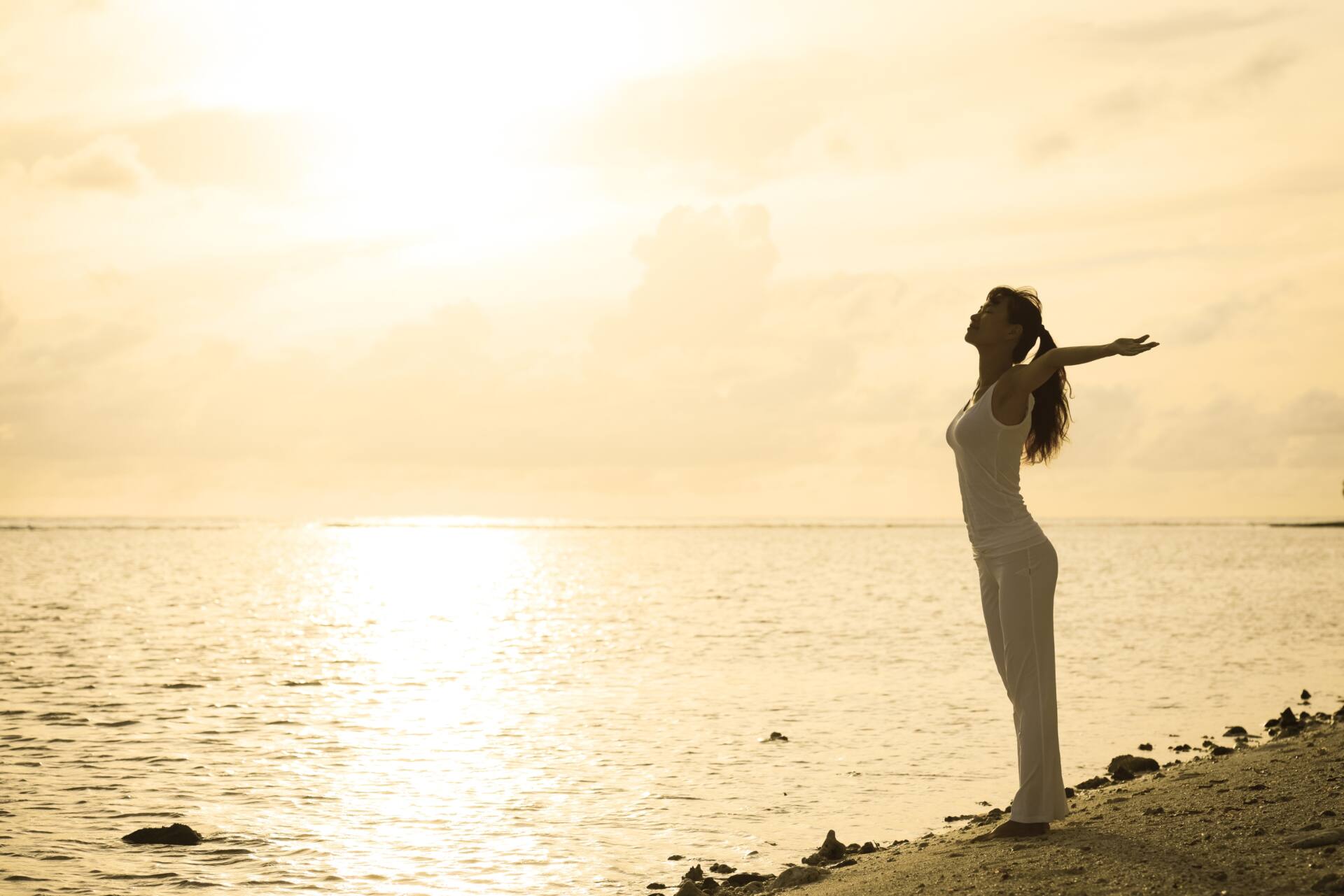 背中の上が痛い